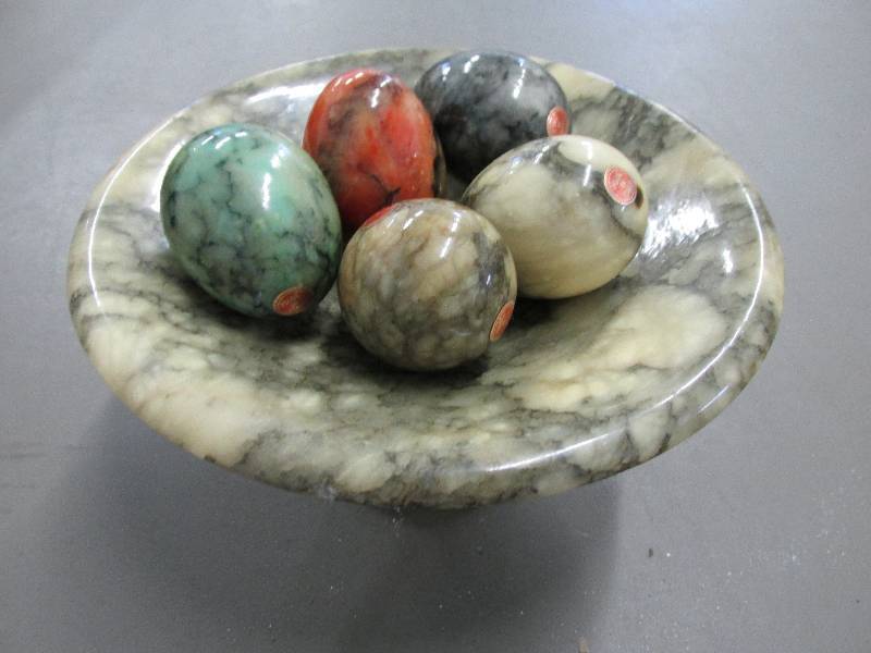lot 196 image: Marble eggs in a dish, made in Ital...