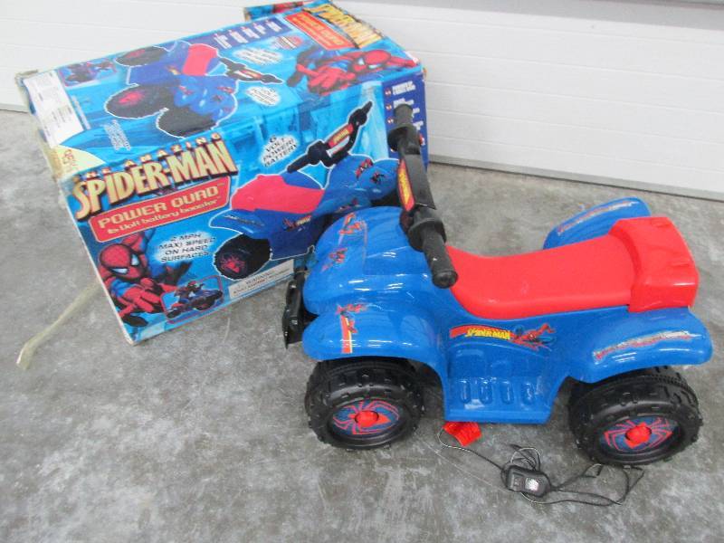 lot 202 image: Spiderman battery operated kids 4 w...