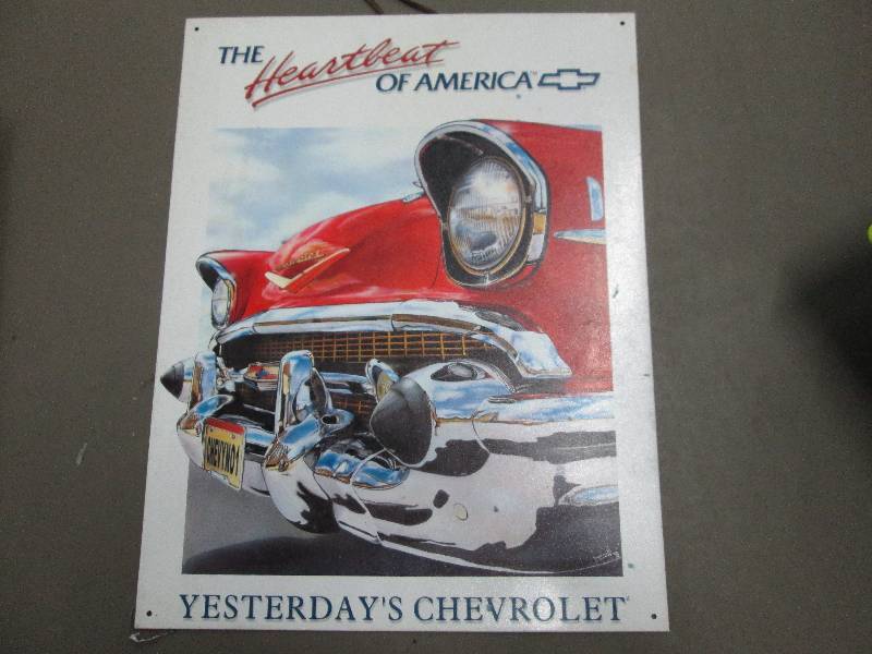 lot 209 image: Metal Chevrolet wall hanging 12.5 x...