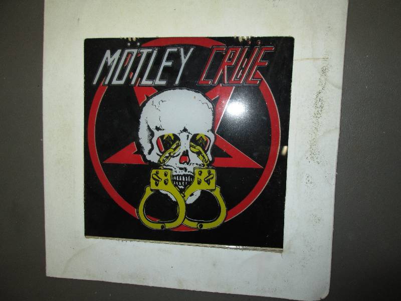 lot 231 image: Motley Crue commemorative glass til...