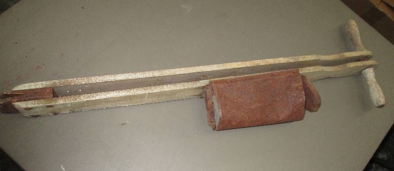 lot 234 image: Wood handled clamp grabber with hol...