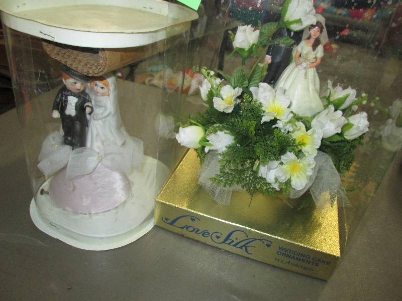 lot 237 image: Wedding cake toppers...