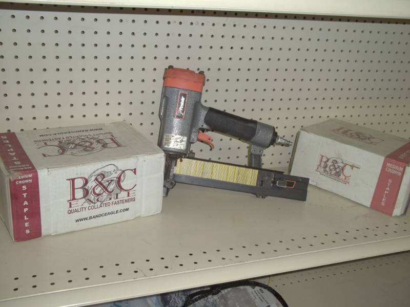 lot 67 image: Paslode Stapler with 2 boxes of staples, may need o ring kit