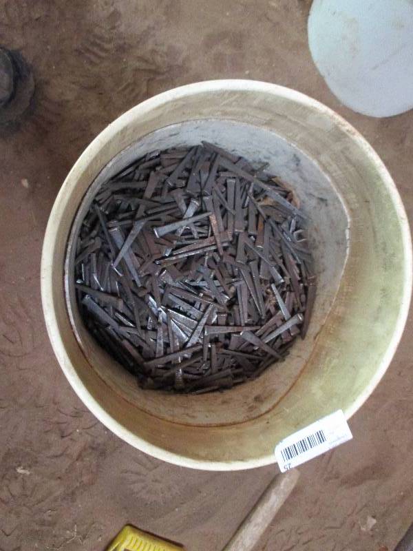 lot 25 image: Bucket of nails