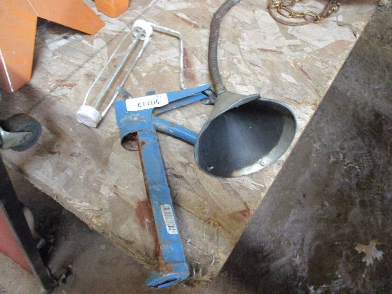 lot 51 image: funnelcaulk gun roller