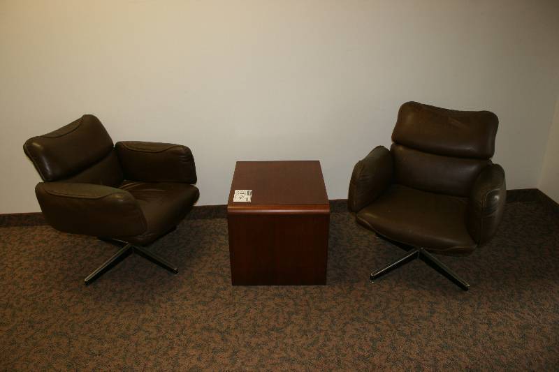 lot 1063 image: Lot of (3) Including Leather-Style Chairs wMetal Frames (2), 28 x 29 x 30 Wood-style End Table, 20 x 26 x 19.