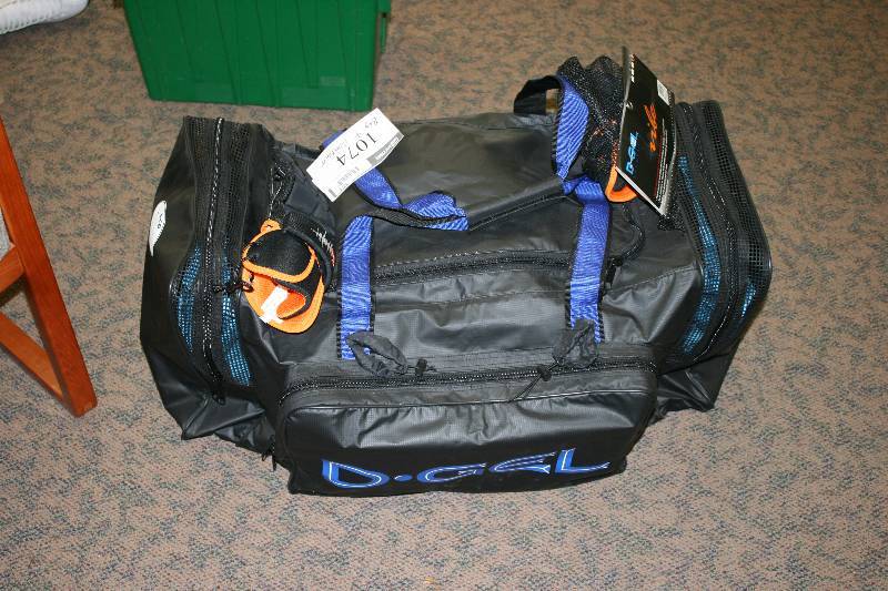 lot 1074 image: Duffle Bag Lot Including D-Gel Duffle Bag Protective Gloves Play Maker Dry Erase Boards And More.