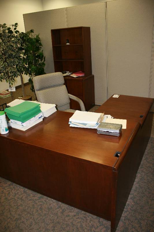 lot 1089 image: Lot of (4) Including Wood-Style Office Desk wDrawers, L-Shaped, 73 x 66 x 30 x 35 Wood Style Cabinets wTwo Drawers, 20 x 37 x 29.5, 20 x 35 x 68  Office Chair wArm Rests & Wheels Does Not Include Contents.