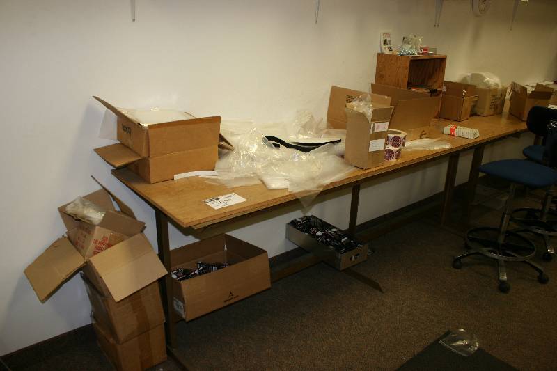 lot 1054 image: Contents of Shelf Including Ultra Lace Hockey Laces Velcro Ribbons Plastic Sheeting Roll And More.