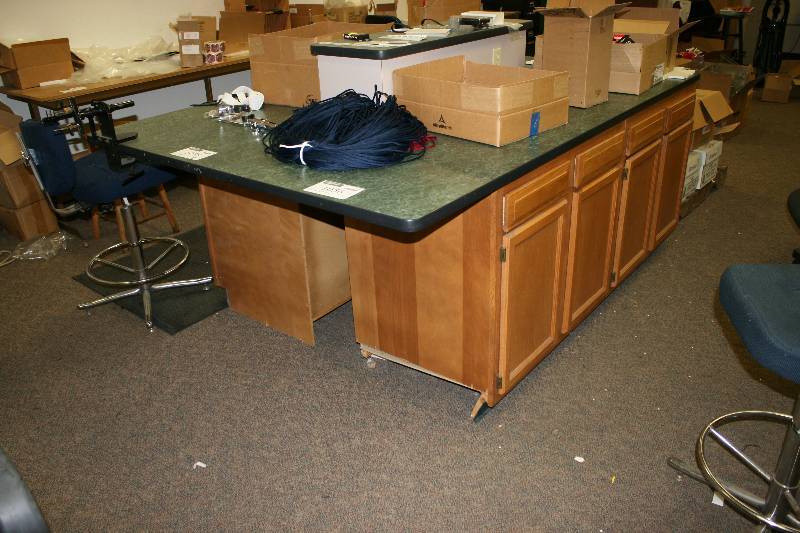 lot 1056 image: Wooden Cabinets wGreen Countertop Multiple Drawers & Cabinets 60 x 90 x 36.