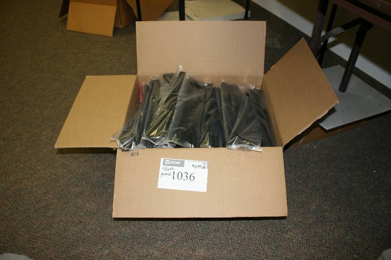 lot 1036 image: Box Lot of Plastic Skate Guards Black.