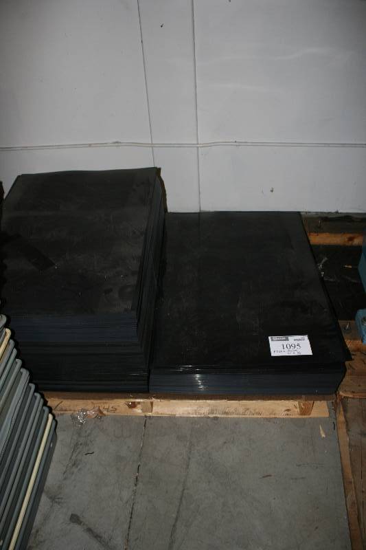 lot 1095 image: Pallet Lot of Black Plastic Sheets 37 x 25.