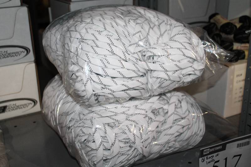 lot 517 image: Bag Lot of (2) C.H.A. Hockey Laces White wBlack.