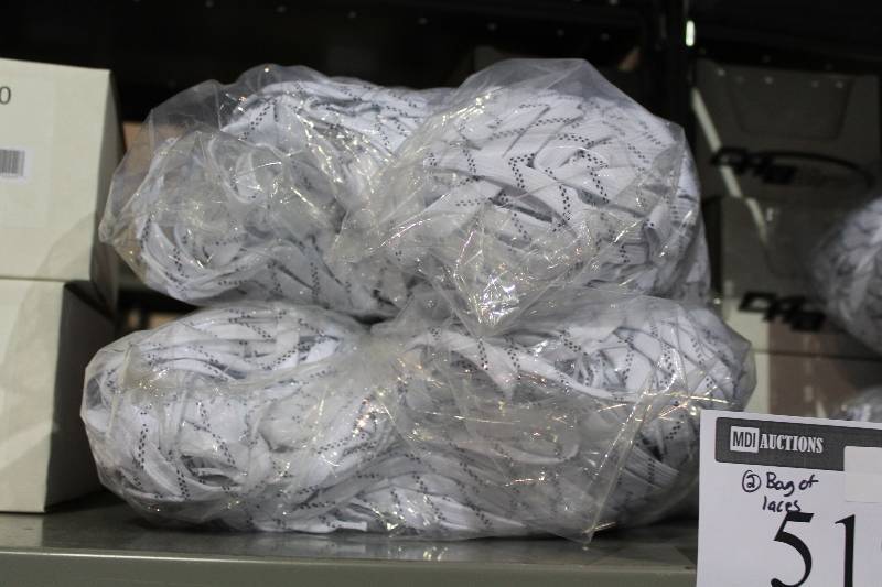 lot 519 image: Bag Lot of (2) C.H.A. Hockey Laces White wBlack.