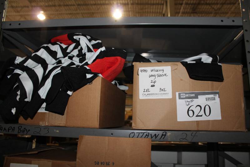 lot 620 image: Shelf Lot of Wicking Long Sleeve Referee Zip-Ups w & wout Orange Stripe 2XL, 3XL, XXL.