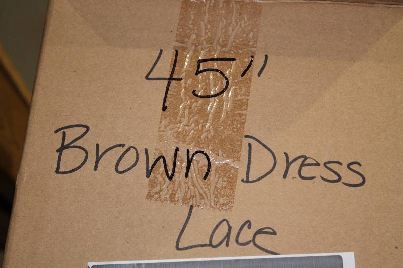 lot 718 image: Box of C.H.A. 45 Brown Dress Lace The Ultra Lace.