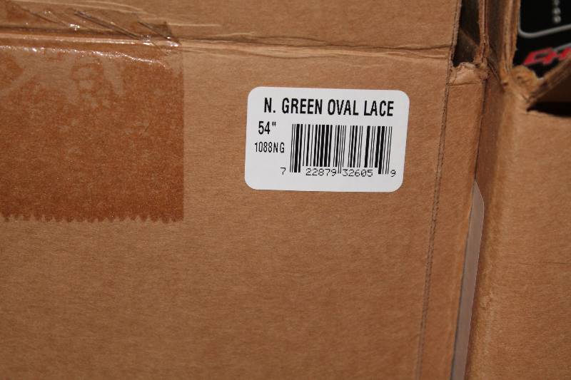 lot 756 image: Box of C.H.A. 54 Neon Green TT Oval Lace The Ultra Lace.