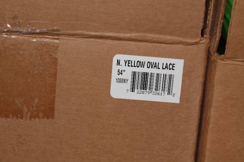 lot 757 image: Box of C.H.A. 54 Neon Yellow TT Oval Lace The Ultra Lace.