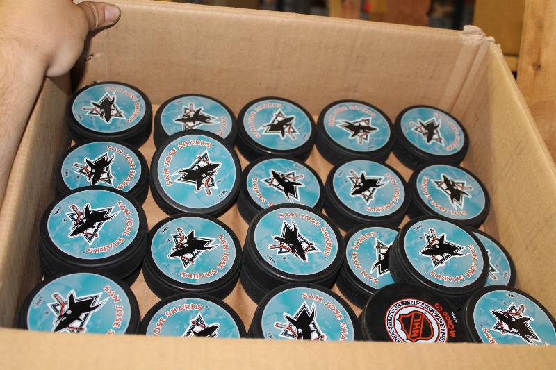 lot 805 image: Box of San Jose Sharks Hockey Pucks wLogo.