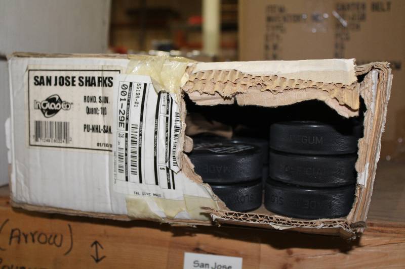lot 806 image: Box of San Jose Sharks Hockey Pucks wLogo.