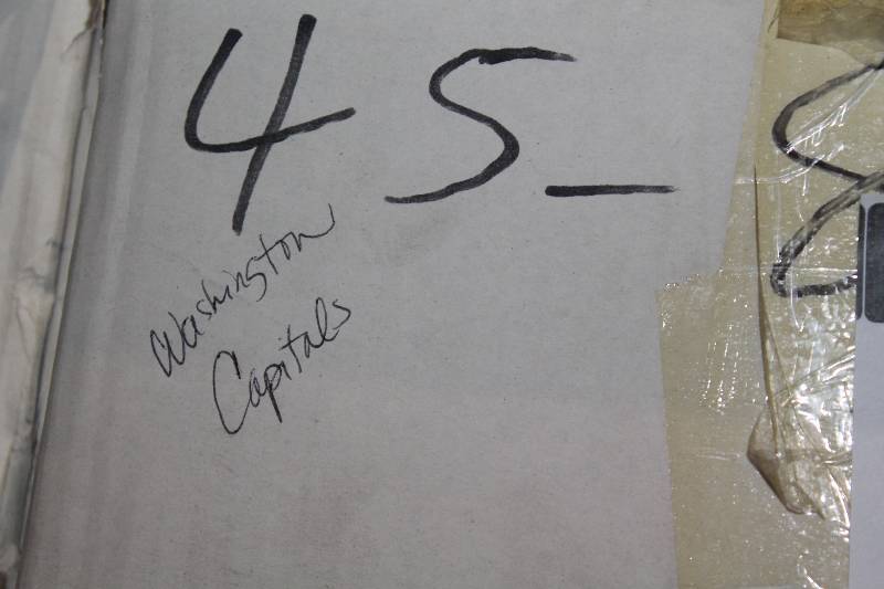 lot 814 image: Box Lot of Hockey Pucks wWashington Capitals Logo.