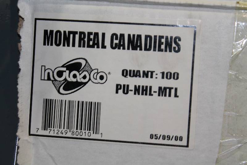 lot 816 image: Box Lot of Hockey Pucks wMontreal Canadiens Logo.