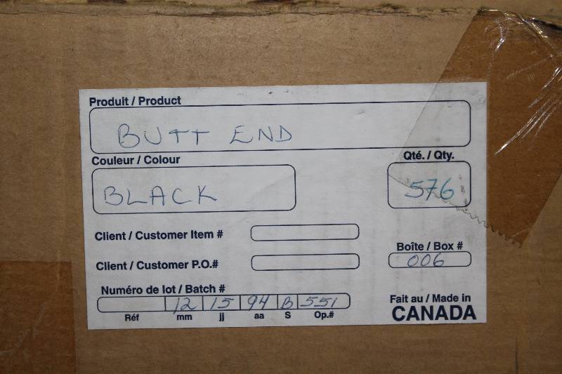 lot 830 image: Box Lot of (4) Hockey Stick Ends Black Plastic.