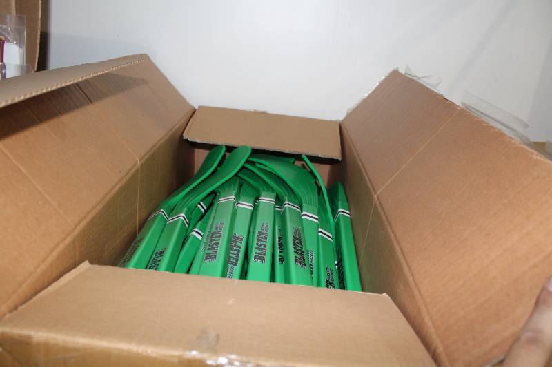 lot 834 image: Box Lot of Mini Hockey Sticks Blaster Type Green.