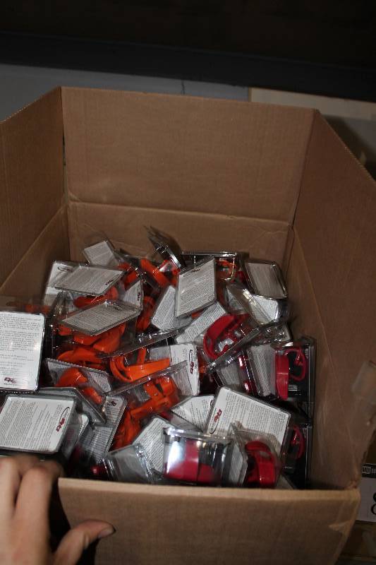 lot 854 image: Box Lot of Triton Armor Mouth Guards Orange & Red wStrap.