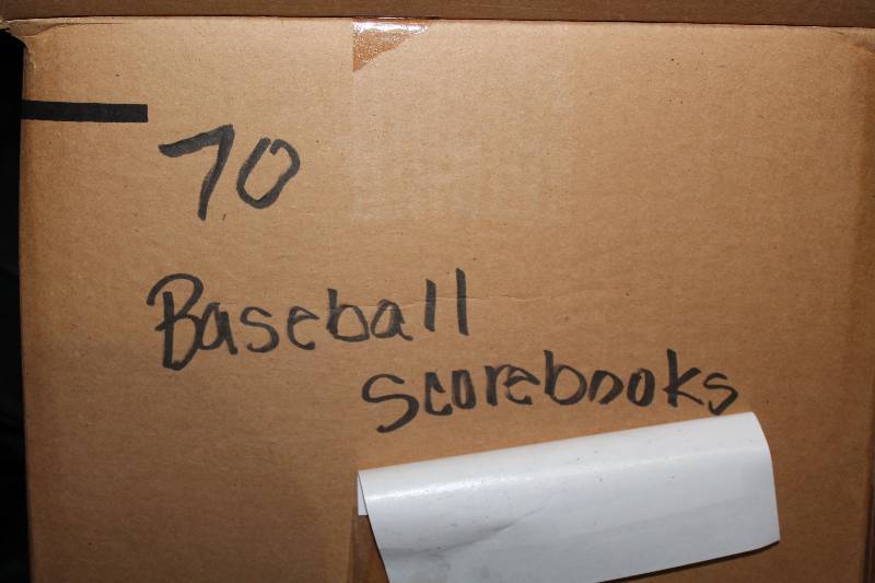 lot 858 image: Box Lot of Baseball Scorebooks 18 Space Detailed BaseballSoftball Scorebooks Bound app. 70 ct.