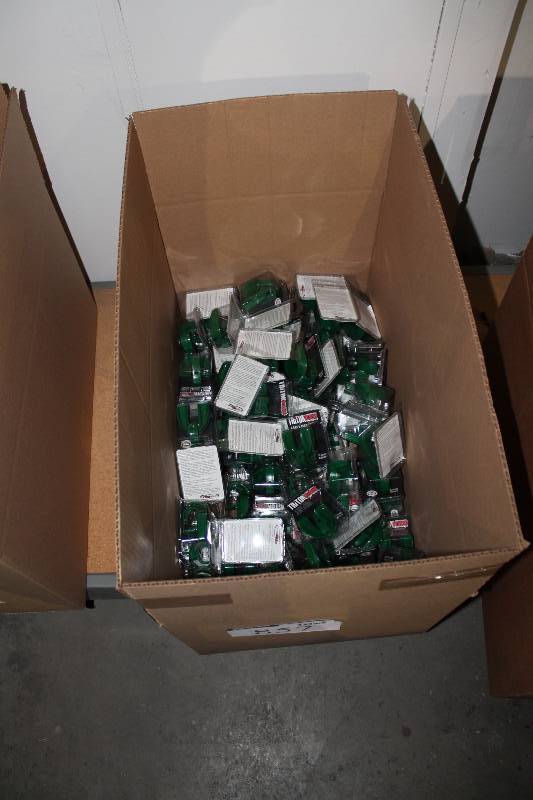 lot 857 image: Box Lot of Triton Armor Mouth Guards Green wStrap.