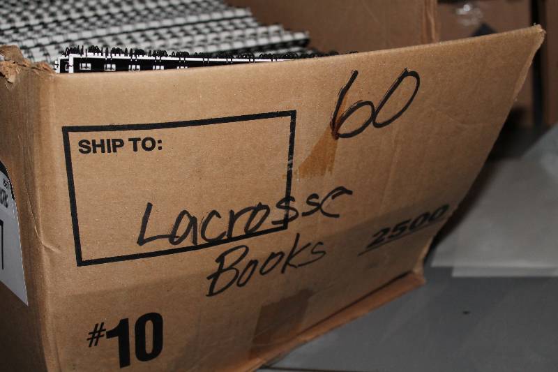 lot 867 image: Box Lot of Official Lacrosse Score Books C.H.A. Brand Spiral Bound.