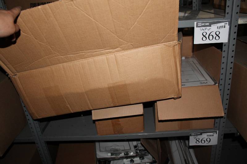 lot 868 image: Shelf Lot Including Lacrosse Play Maker Dry Erase Board C.H.A. Brand.