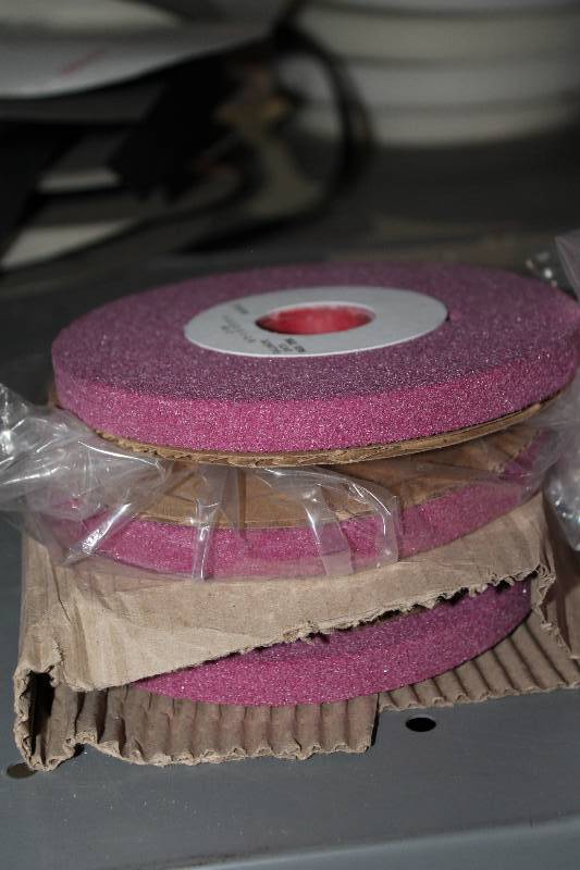 lot 976 image: Lot of (4) 6 x 12 x 1-14 Grinding Wheels Max RPM 4140.