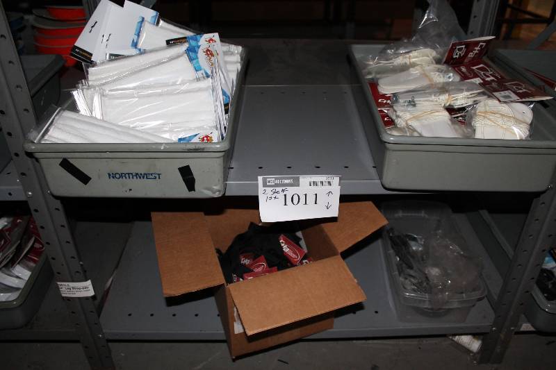 lot 1011 image: Contents of (2) Shelves Including Nash Goal Mask Sweatbands, 2 Soft Terry Cloths Toe Plates Laces And More.