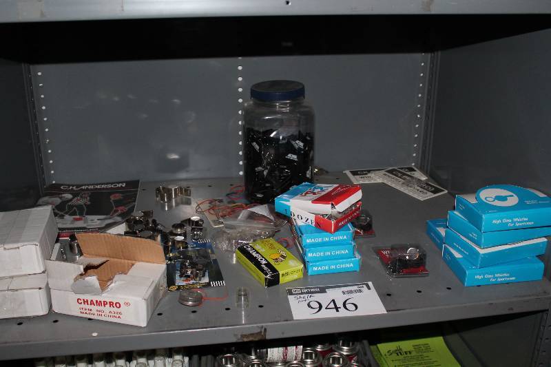 lot 946 image: Shelf Lot Including Miscellaneous Referee Whistles Jar of Acme Cushion Grips And More.