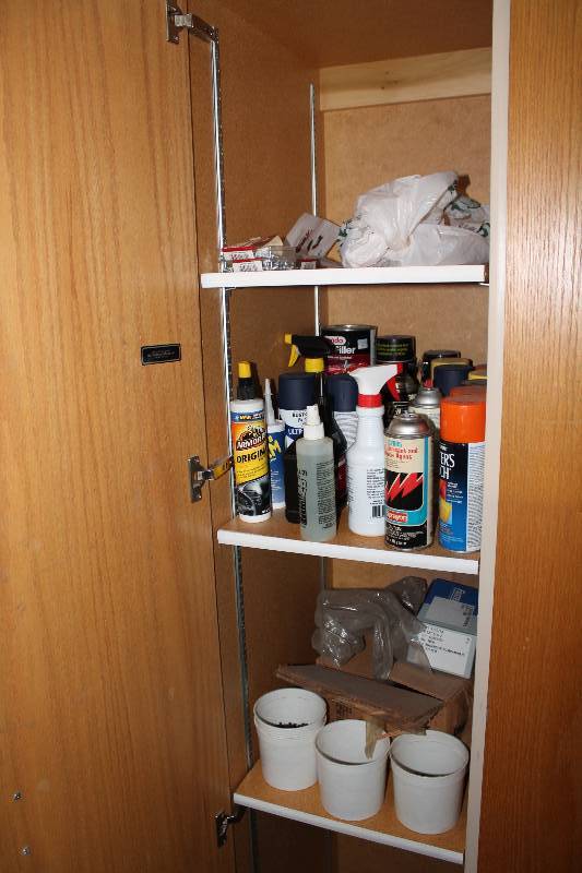 lot 952 image: Contents of Cabinets Including Miscellaneous Cleaners & Spray Bottles Buckets of Hardware And More.