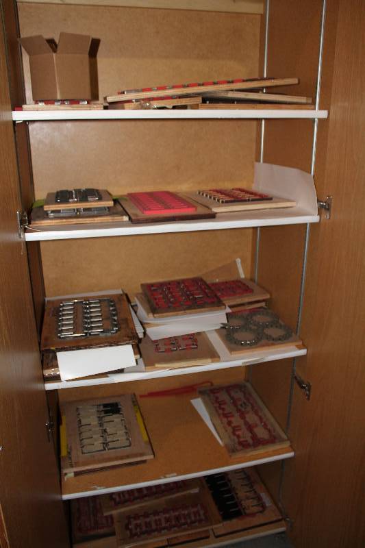 lot 953 image: Contents of Cabinet Including Custom Wooden Dies.