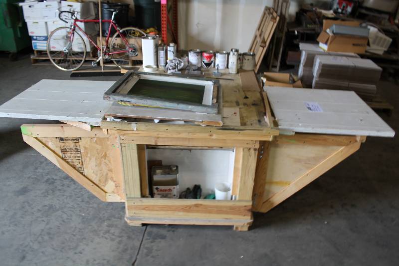 lot 1125 image: Screen Printing Station w5 Play Maker Prints & Lower Print Storage Cubbies Includes Miscellaneous Paints.
