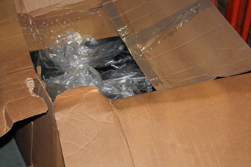 lot 136 image: Box Lot of Black Plastic Disks.
