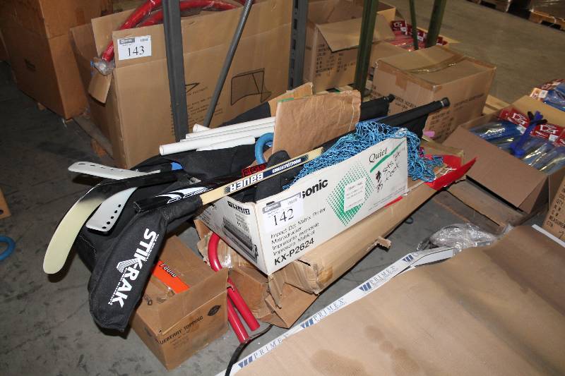 lot 142 image: Hockey Lot Including Hockey Sticks Hockey Net & Goal Hockey Bag And more.
