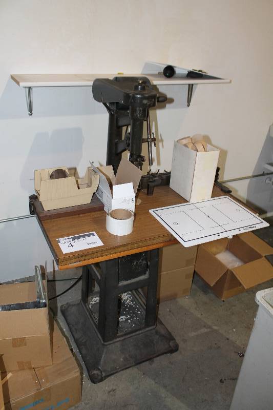 lot 4 image: Single Hole Punch wStand & Table Top General Motors 14H.P. A.C. Motor 28 x 37 x 54.