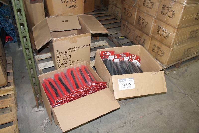 lot 212 image: Pallet Lot of Plastic Centerpede Hockey Guards app. 100pcsBox.