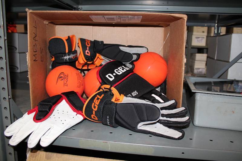 lot 317 image: Bin Lot Including Broom Balls, Orange D-Gel Broom Ball Gloves.