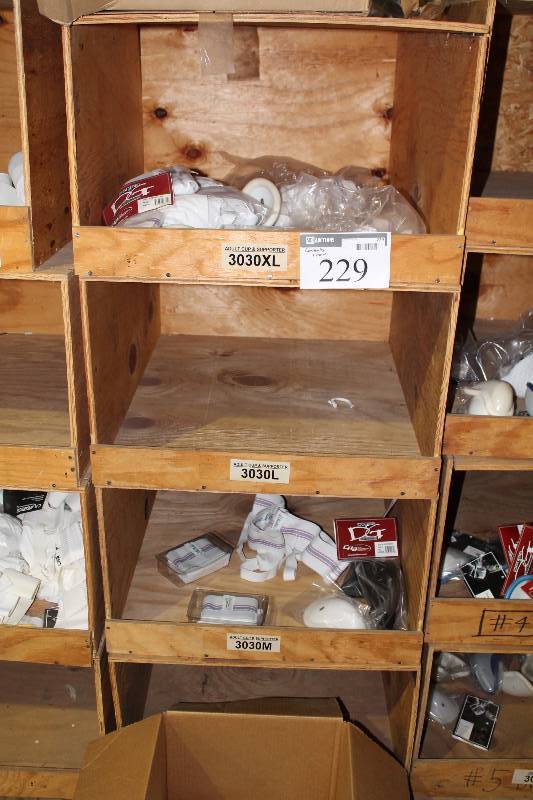 lot 229 image: Contents of Row Including Adult Cup & Supporter, 3030M Adult Cup & Supporter 3030XL And More.