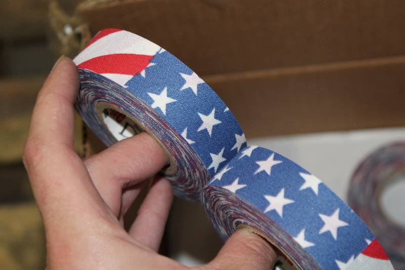 lot 276 image: Box Lot of (2) C.H.A. USA Flag Cloth Tape 1 x 20Yards 36perBox.