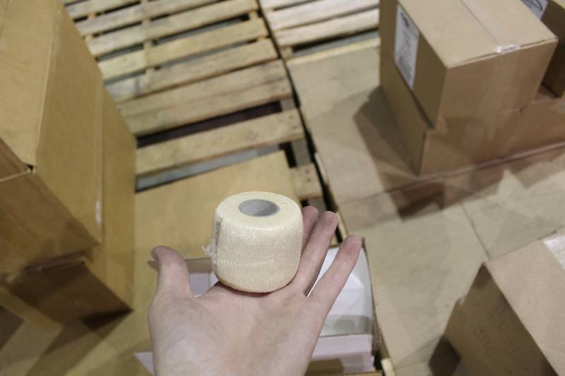 lot 270 image: Box Lot Of (2) Including Economy Trainers Tape, White, 1.5 C.H. Anderson Cotear Cohesive White Tape, 2 x 5yard Rolls.