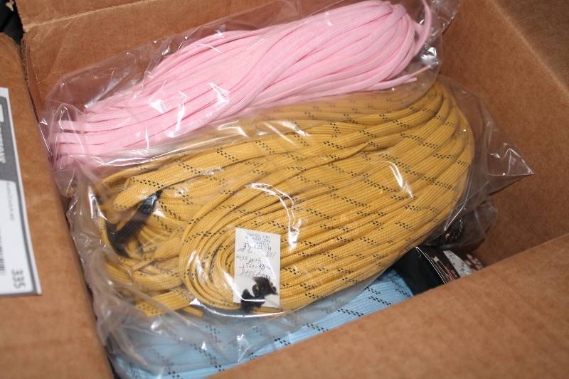 lot 335 image: Box Lot of Miscellaneous Hockey Laces BlueTanPink And More.