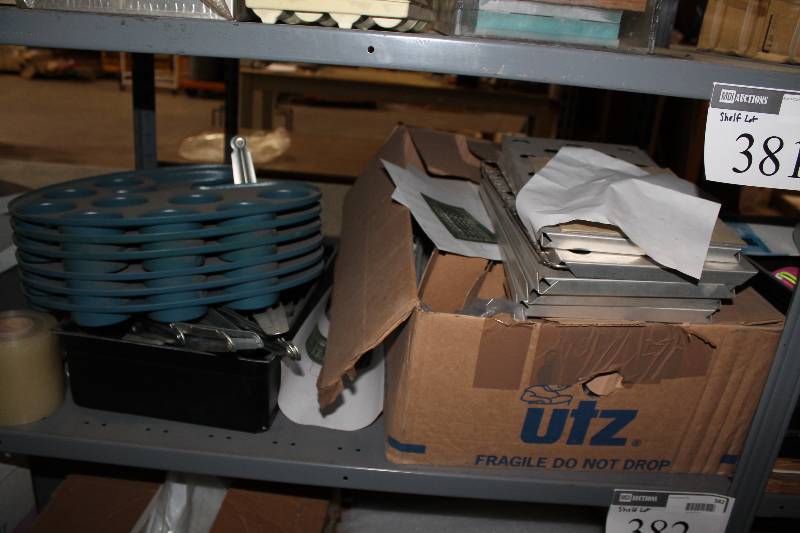 lot 381 image: Shelf Lot Including Paint Trays, Blue Metal Hardware And More.