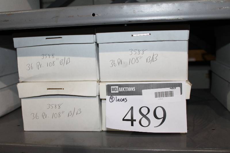 lot 489 image: Box Lot of (4) 108 Blue Black Hockey Laces app. 36perBox.